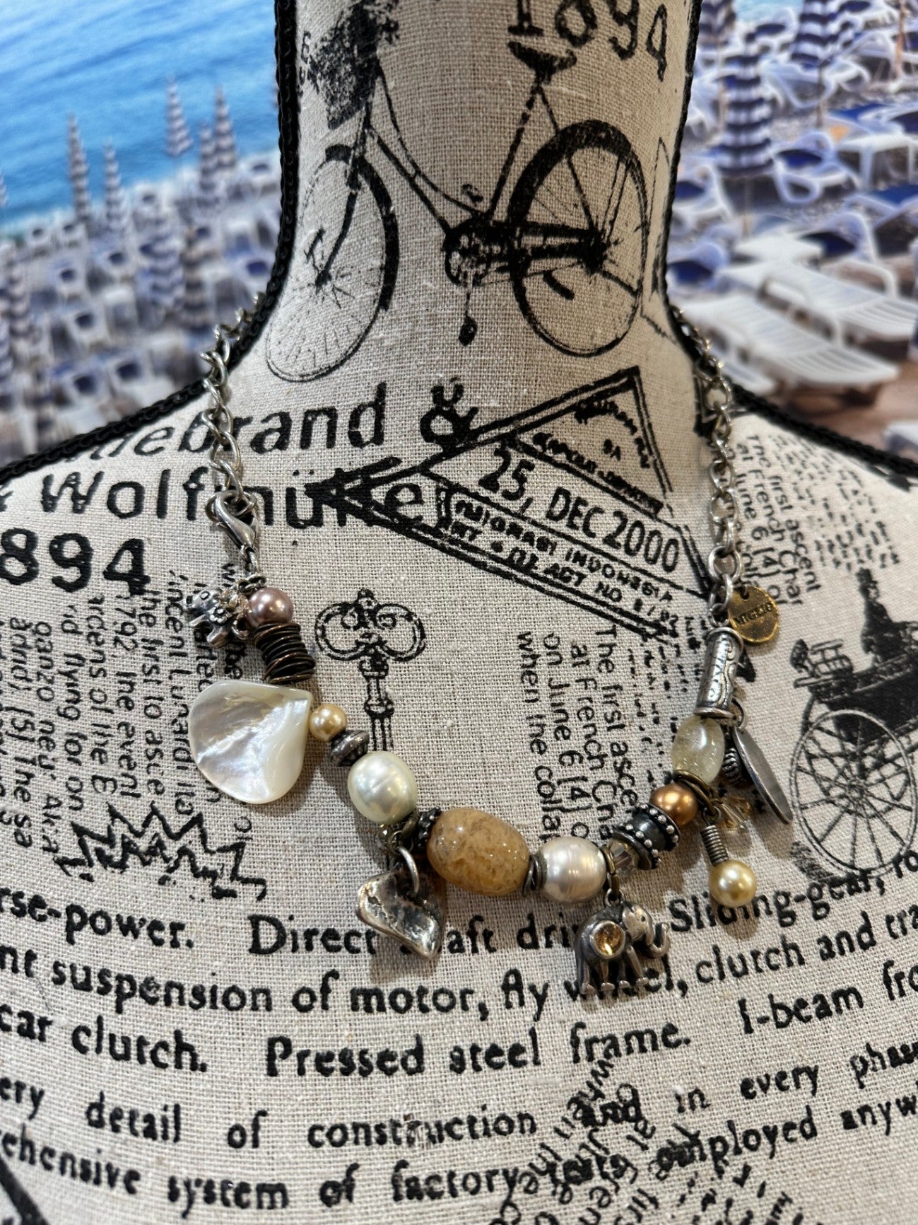 Vintage Charm Necklace - Includes elephants & shells