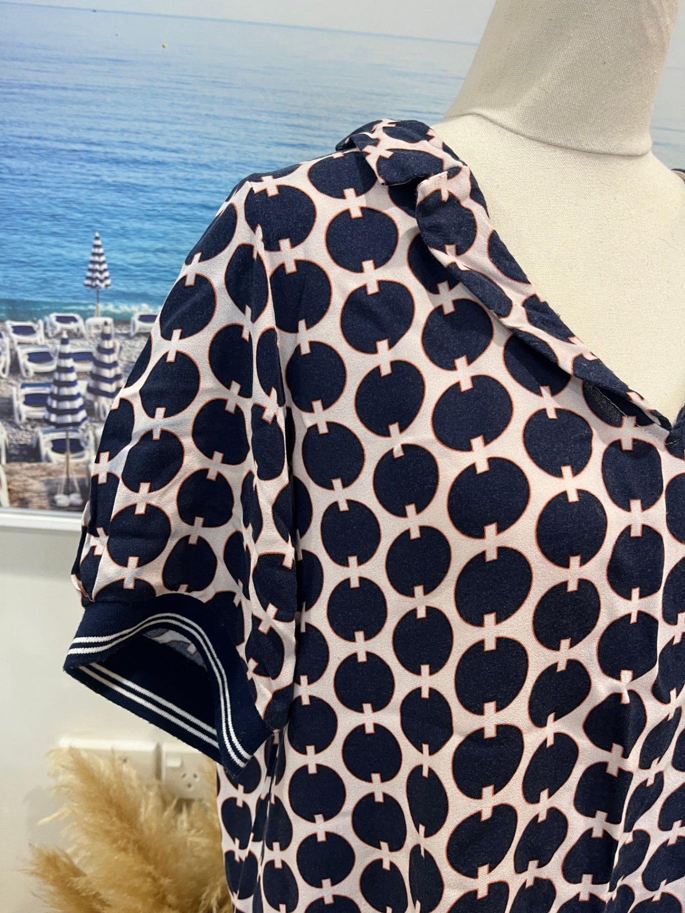 TANTRUM Top 10 Pink and navy with a geometric pattern