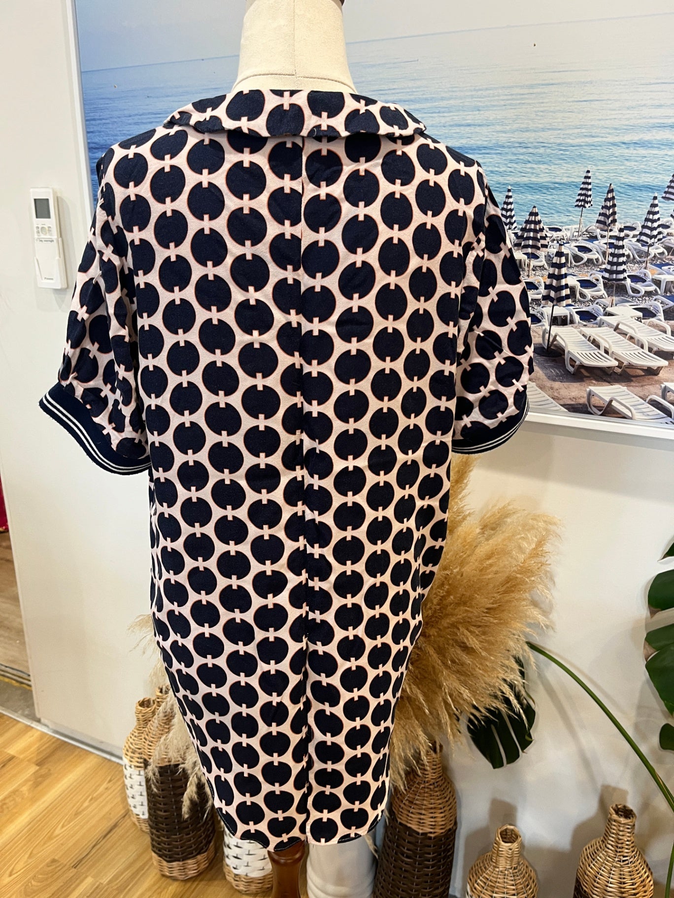 TANTRUM Top 10 Pink and navy with a geometric pattern