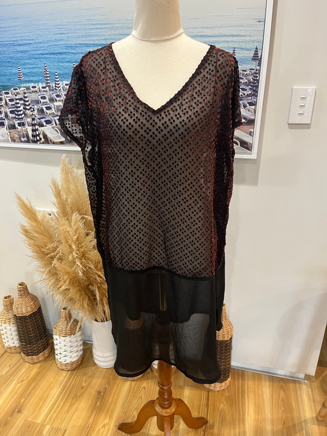 Nes Top Black with reddish-orange dots
