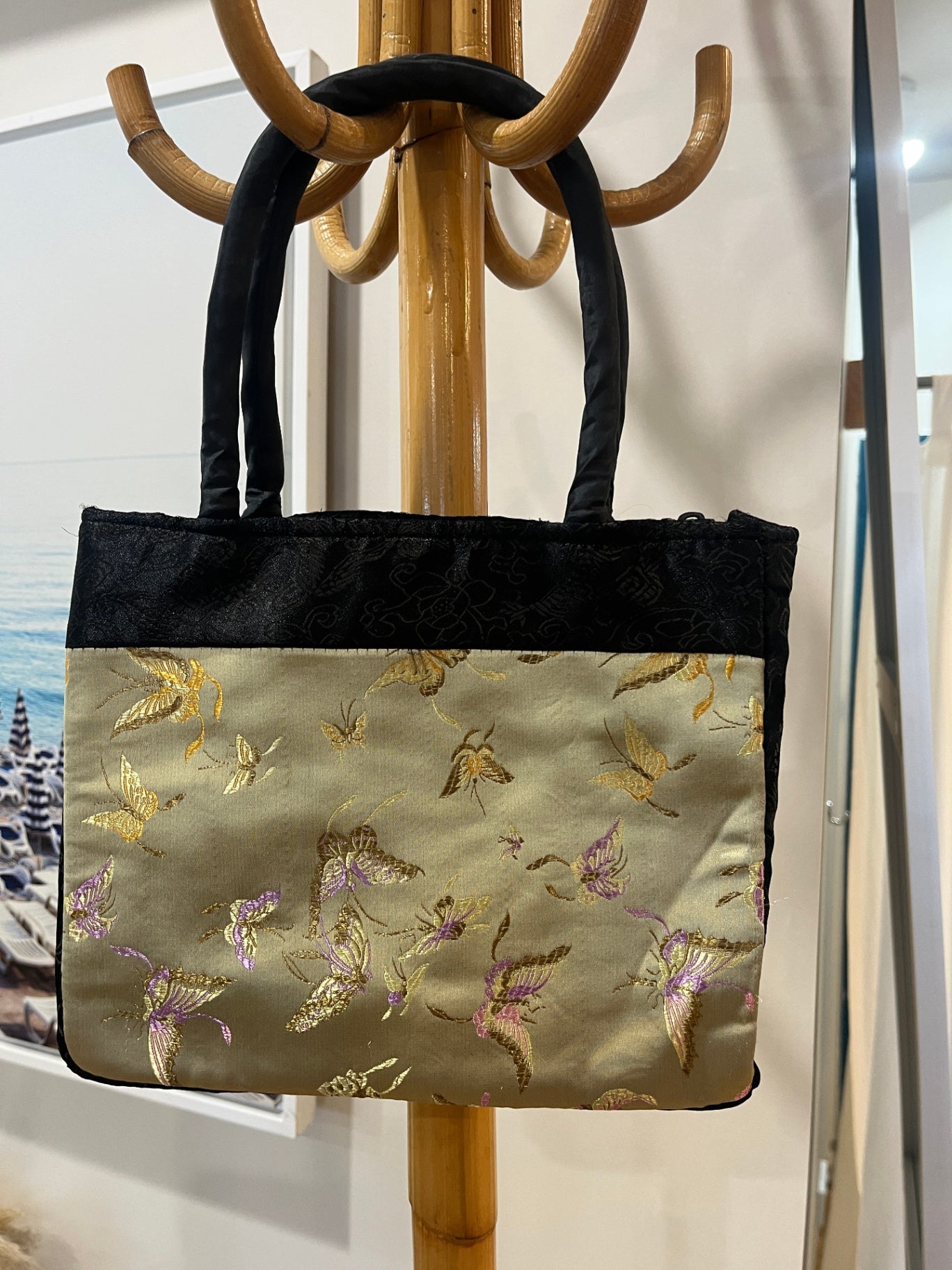 Black and Gold Handbag with Butterfly Design